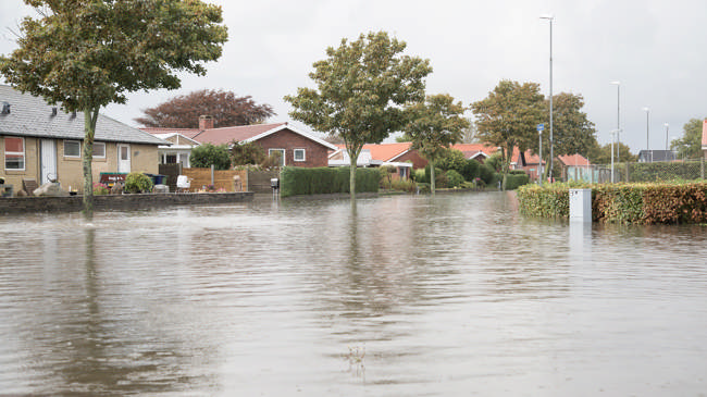 Oversvømmet villakvarter. Foto: Colourbox.